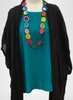 Obscure Cardigan (Chocolate Gauze), layered over the Starling Top (Mediterranean), topped with a colorful Tagua Necklace (sold in-store only).