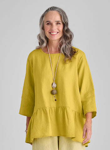 Peplum Tunic, only available in Dark Teal.  Model is wearing Citrine in size Small.  **Color shown is NOT available, we are only showing as an example for the fit and shape.