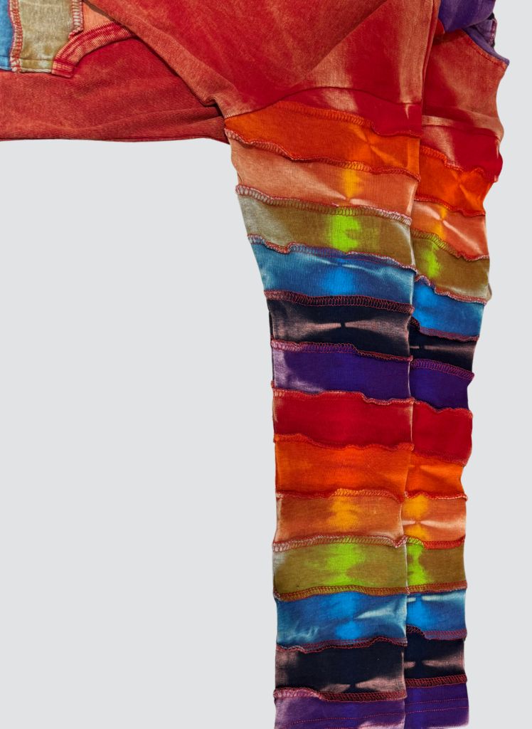 Hooded Jacket, shown in Red Multi. Featuring the multi-colored Rainbow sleeve detail