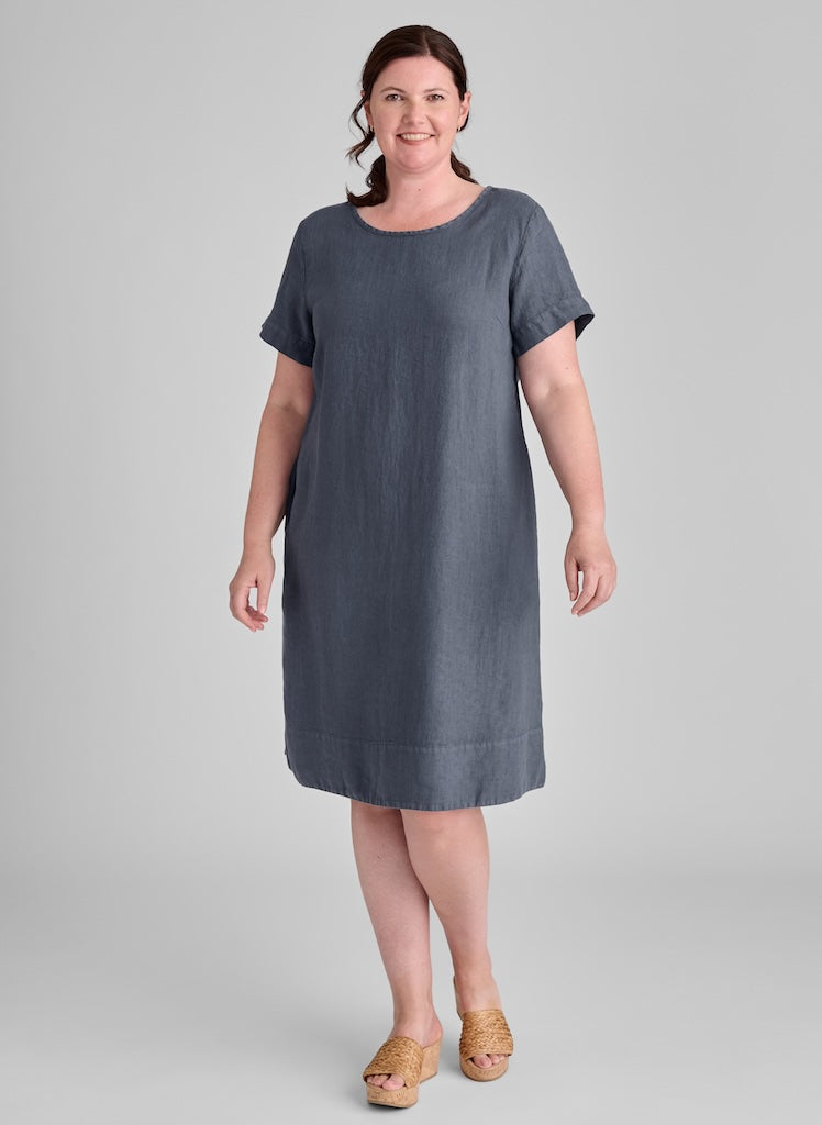 Roadie Tee Dress, shown in Slate (blue-grey), size Medium.  Model is 5'9" tall.  100% European Linen.  2 side pockets, side slits on either side of the bottom hem.