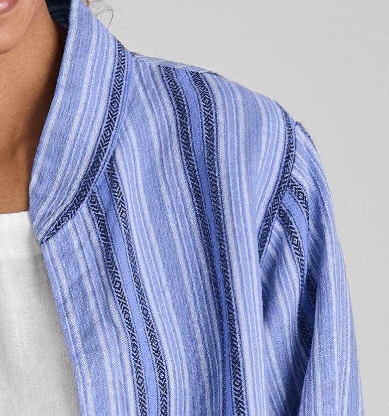 Seamly Jacket, shown in Sky Stripe.  Featuring a close up of the stand up collar and drop shoulder sleeve detail.