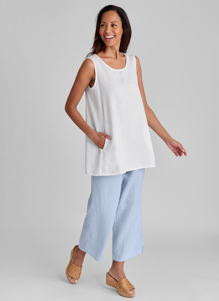 We DO NOT have a photo of the Floods in Powder.  However, this is an outfit featuring a similar pant that has a wider leg and slightly longer length) to give you a better idea of the color.  This photo shows the SOCIABLE FLOODS in Powder (light blue) and SIDE POCKET TUNIC in white.    