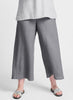 Sociable Flood (shown in Castlerock, dark grey) 100% Linen, Flat Front waist, 3/4 elastic in back, elegant wide legs. Model is 5'9" tall, wearing size Medium. If you are shorter, then this pant will land further down on your leg.