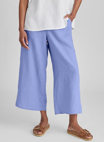 Sociable Floods, shown in Periwinkle, size Small.  Model is 5'9" tall.  100% European Linen, Preshrunk, Machine Washable.