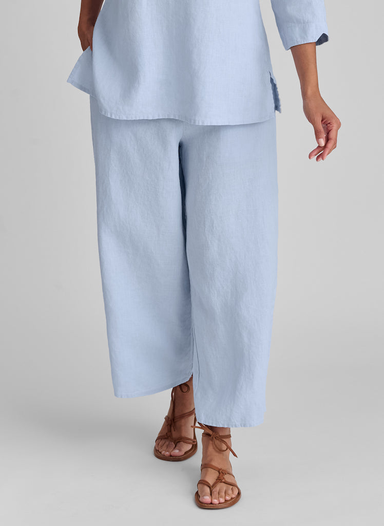 Sociable Floods, shown in Powder (light blue), size Small.  Model is 5'9" tall.  100% European Linen.