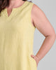 Tahira Dress, shown in Citrine Yarn Dye, size Medium.  Zoomed in on the neckline and side pocket detail.