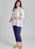 Terra Top (shown in White) layered over the slim Travel Pant (shown in Indigo).  Model is 5'9" tall, wearing size Medium.  100% European Linen, Machine Washable. 