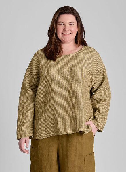 Throw it on, shown in Tobacco Seersucker, size Medium.