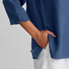 V Pullover, shown in Ocean.  Zoom on v-notch detail along the sleeve, and side slit detail on the bottom hem.