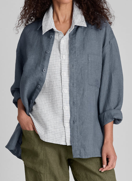 Whole Shirt, shown in Slate, size Small.  Worn open, as a light jacket, with the sleeves rolled up.  Layered over the Cherished Shirt (color n/a) and the Keen Pant (in Herb).  Unisex, 100% Medium-weight European Linen