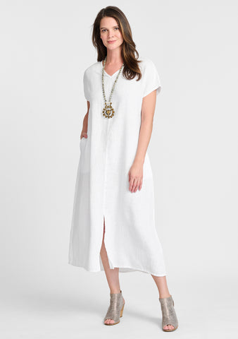 Yara Dress, shown in White.  100% Linen, FLAX Core 2023.  Model is 5'9" tall, wearing size Small.