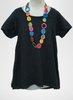 Blossom Blouse, shown in Ebony (Black), layered over the Select Tank in Marble Yarn Dye.  Paired with a colorful Tagua Necklace (sold in store only).