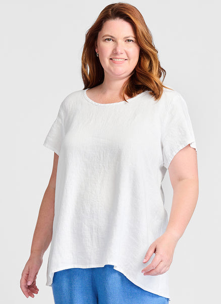 Blossom Blouse, shown in solid White.  Model is 5'9" tall, wearing size Medium.