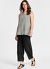 Blossom Tank (in Smokey Grid) paired with the Seamly Pant (in solid Black).  Model is 5'9" tall, wearing size Small.