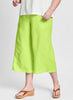 Daylily Pant (shown in Chartreuse). Model is 5'9" tall, wearing size Medium. 100% Linen, Solid Colors.