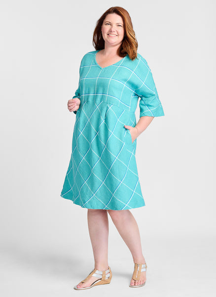 Dolman Dress (shown in Cyan Tattersall), Model is 5'9" tall, wearing size Medium.