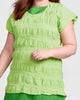 Feather Tee, shown in Green Apple Pucker (layered over a sleeveless dress)  FLAX Additions.