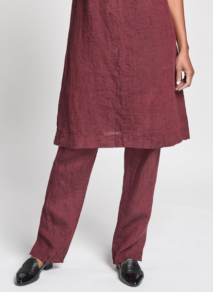 Pocketed Social Pant (shown in Garnet Yarn Dye), 100% Yarn-Dyed Linen (Pre-shrunk, Machine Washable), tailored pant, with a thin elastic waistband and a flat front, full length tapered legs, with side slits. Available in Women's Regular and Plus sizes, FLAX Fall Traveler 2021