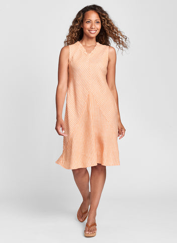 Special Dress (shown in Clementine Stripe) - sleeveless linen dress cut on the bias, with shaping seams, and ruffle detail on the v-neckline and the back hem.  100% Linen, FLAX de Soleil 2022.