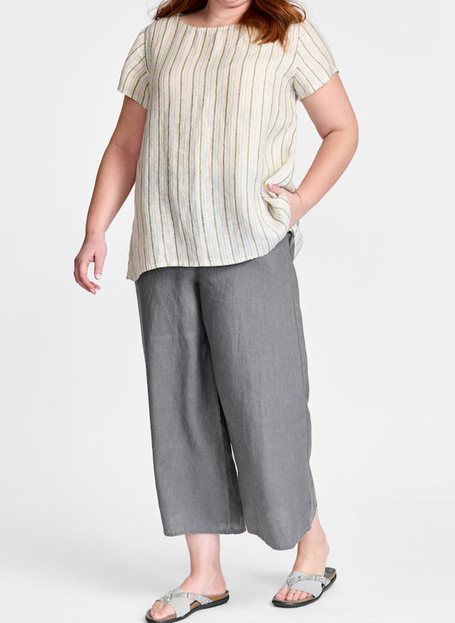 Sun Tee (in Summer Stripe) paired with Sociable Floods (in solid Castlerock, grey).  Model is 5'9" tall, wearing size Medium.