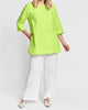 Muse Tunic (in Chartreuse) layered over the Flowing Pant (in White), Model is approximately 5'9" tall. 100% Linen.