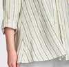 X-Specially Nice (in Summer Stripe), close-up on curved Seam detail with hidden pockets, and corozo buttons.