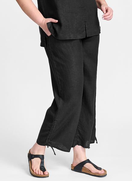 Zen Pant, shown in Onyx (solid Black). Model is 5'9" tall, wearing size Medium.